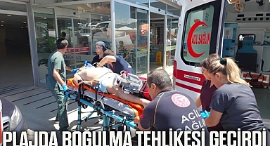 Plajda boğulma tehlikesi geçirdi