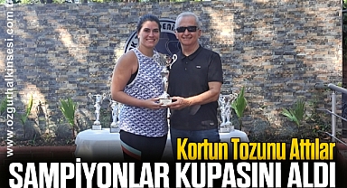 Kortun Tozunu Attılar