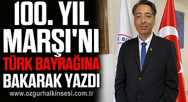 100. Yıl Marşı'nı Türk bayrağına bakarak yazdı