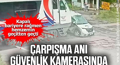 Aracın yolcu treniyle çarpışma anı güvenlik kamerasında