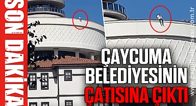 ÇAYCUMA BELEDİYESİNİN ÇATISINA ÇIKTI