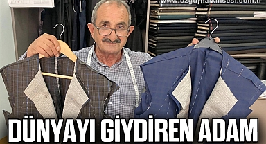 DÜNYAYI GİYDİREN ADAM