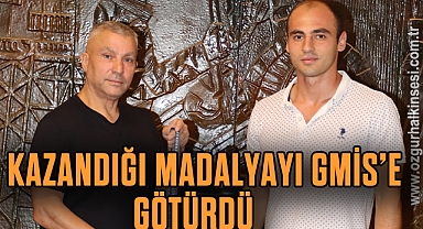 Kazandığı madalyayı GMİS'e götürdü