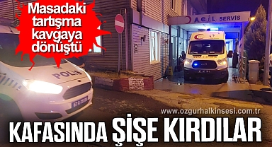 Masadaki tartışma kavgaya dönüştü, kafasında şişe kırdılar
