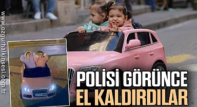 Polisi görünce el kaldıran çocuklar ilgi odağı oldu