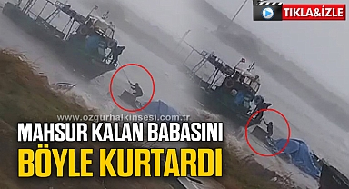 Mahsur kalan balıkçıyı oğlu böyle kurtardı
