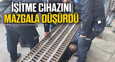 İşitme cihazını mazgala düşürdü