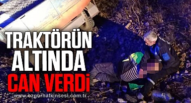 Devrilen traktörün altında can verdi