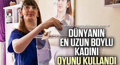 5 dünya rekoru bulunan “Dünyanın en uzun boylu kadını” oyunu kullandı