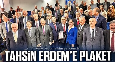 TAHSİN ERDEM’E PLAKET