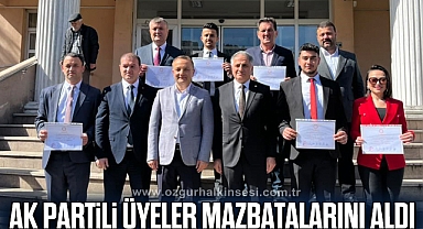 AK Partili üyeler mazbatalarını aldı