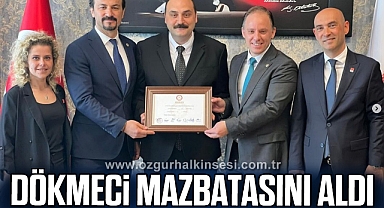 DÖKMECİ MAZBATASINI ALDI