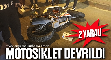 Motosiklet devrildi, 2 kişi yaralandı