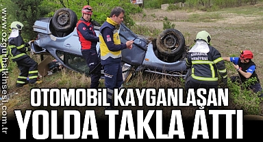 Otomobil kayganlaşan yolda takla attı