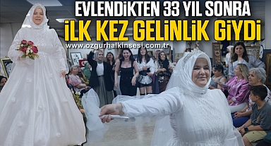 Evlendikten 33 yıl sonra ilk kez gelinlik giydi
