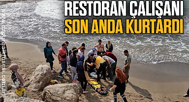 Denizde akıntıya kapılan vatandaşı boğulmaktan restoran çalışanı kurtardı