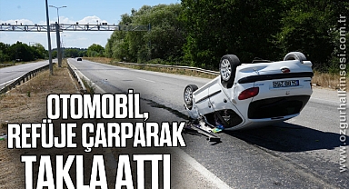 OTOMOBİL,REFÜJE ÇARPARAK TAKLA ATTI