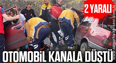 Otomobil kanala düştü: 2 yaralı