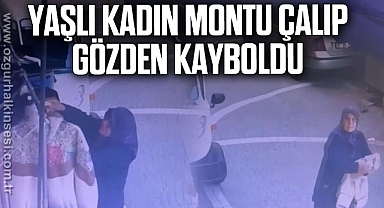 Yaşlı kadın, mağazanın önünde satılan montu çalıp gözden kayboldu