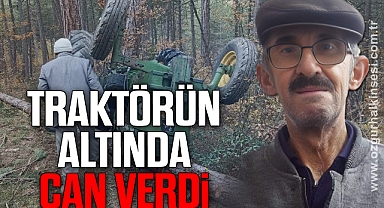 Devrilen traktörün altında kaldı