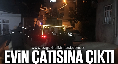 Evin çatısına çıkarak intihara kalkıştı