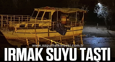 Irmak suyu taştı, tekne karada kaldı