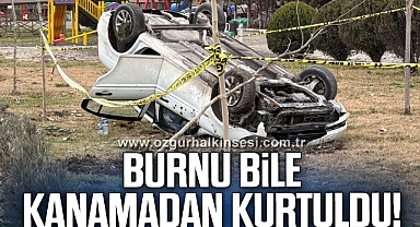 Ters dönen otomobilden burnu bile kanamadan kurtuldu