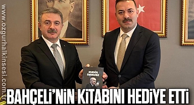 BAHÇELİ’NİN KİTABINI HEDİYE ETTİ