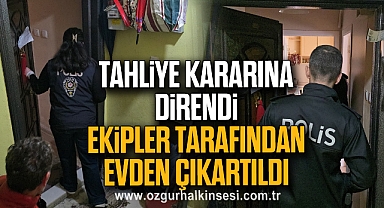 Tahliye kararına direnen kadın ekipler tarafından evden çıkartıldı