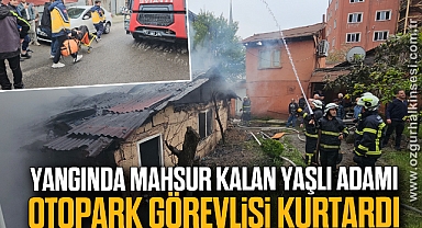 Yangında mahsur kalan yaşlı adamı otopark görevlisi kurtardı