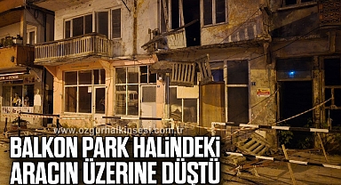 Balkon park halindeki aracın üzerine düştü