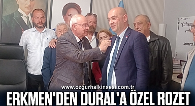 Erkmen'den Dural'a Özel Rozet