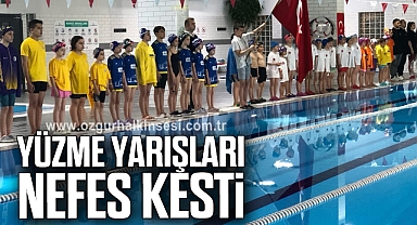 Yüzme yarışları nefes kesti