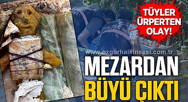 Mezarda bal mumundan yapılmış bebek ve bebeğe sarılı muska bulundu