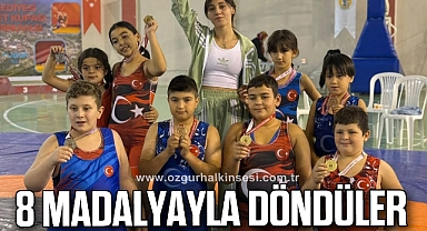 8 MADALYAYLA DÖNDÜLER