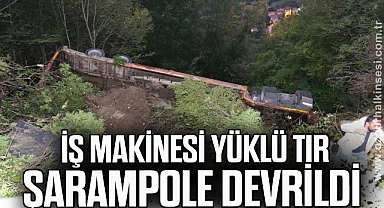 İş makinesi yüklü tır şarampole devrildi