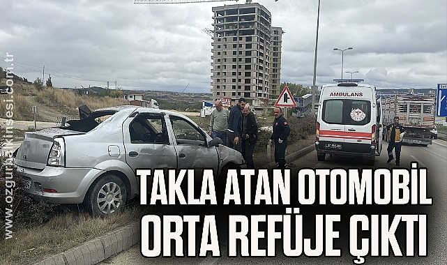 Takla atan otomobil orta refüje çıktı