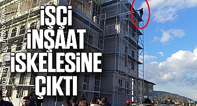 İşçi inşaat iskelesine çıktı