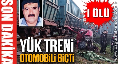 Yük treni otomobili biçti: 1 Ölü