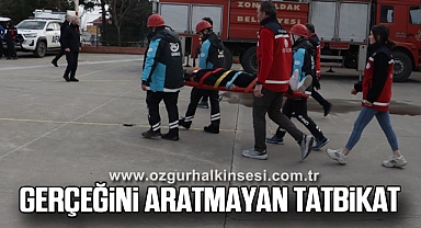 GERÇEĞİNİ ARATMAYAN TATBİKAT