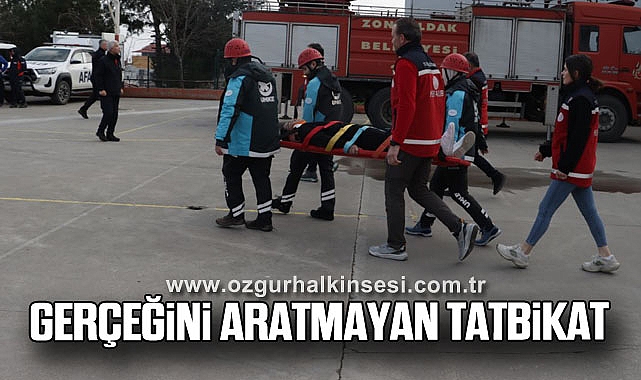 GERÇEĞİNİ ARATMAYAN TATBİKAT