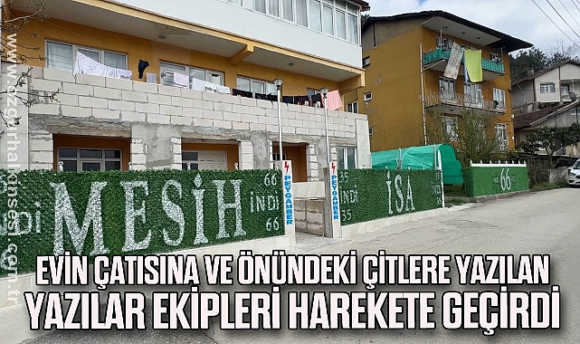 Evin çatısına ve önündeki çitlere yazılan yazılar ekipleri harekete geçirdi