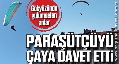 Gökyüzünde gülümseten anlar, paraşütçüyü çaya davet etti