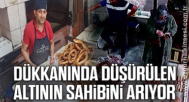 Dükkanında düşürülen altının sahibini arıyor
