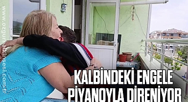Kalbindeki engele piyanoyla direniyor