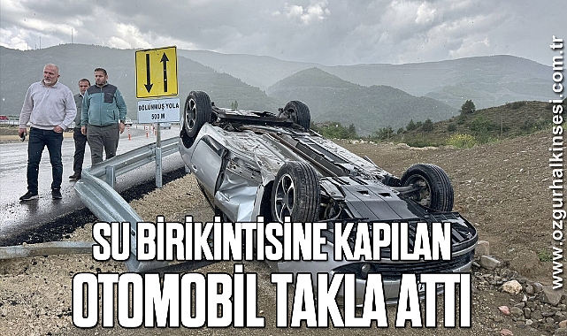 Su birikintisine kapılan otomobil takla attı
