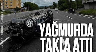 YAĞMURDA TAKLA ATTI