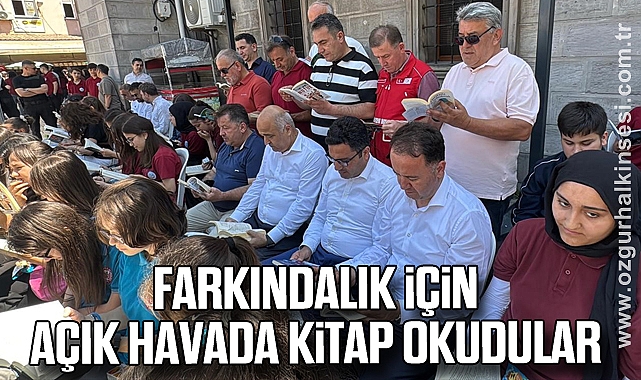 Farkındalık için açık havada kitap okudular