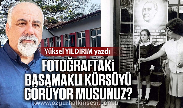 FOTOĞRAFTAKİ BASAMAKLI KÜRSÜYÜ GÖRÜYOR MUSUNUZ?